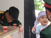 Đứa bé chưa cai sữa mỉm cười trên tay đồng đội của liệt sĩ trong sư đoàn 337